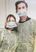 Amanda and dave at a cadaver lab with masks on