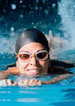 woman swimming with cap and goggles